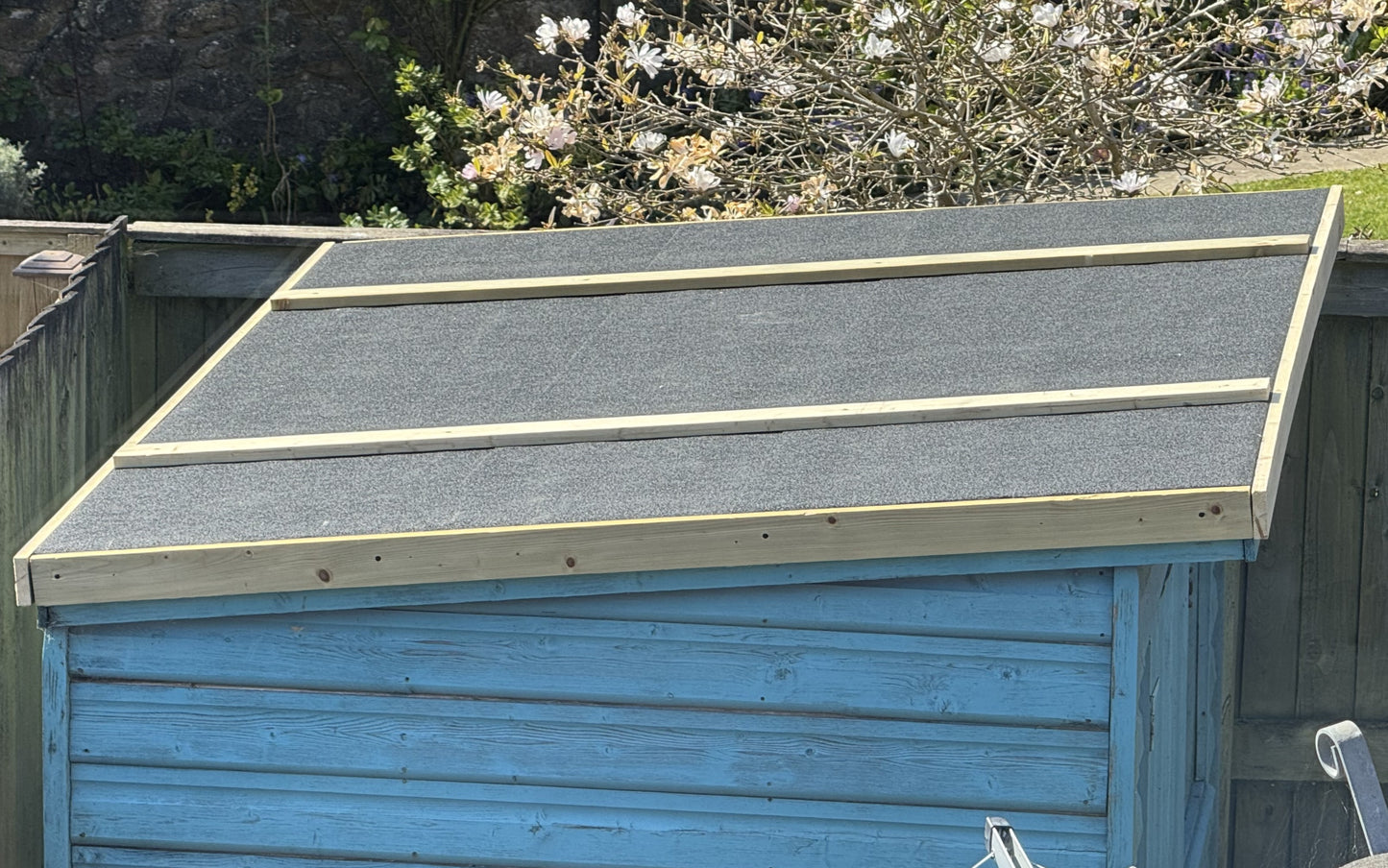 Felt Roof Replacement - Between 10x10 ft and 12x12ft